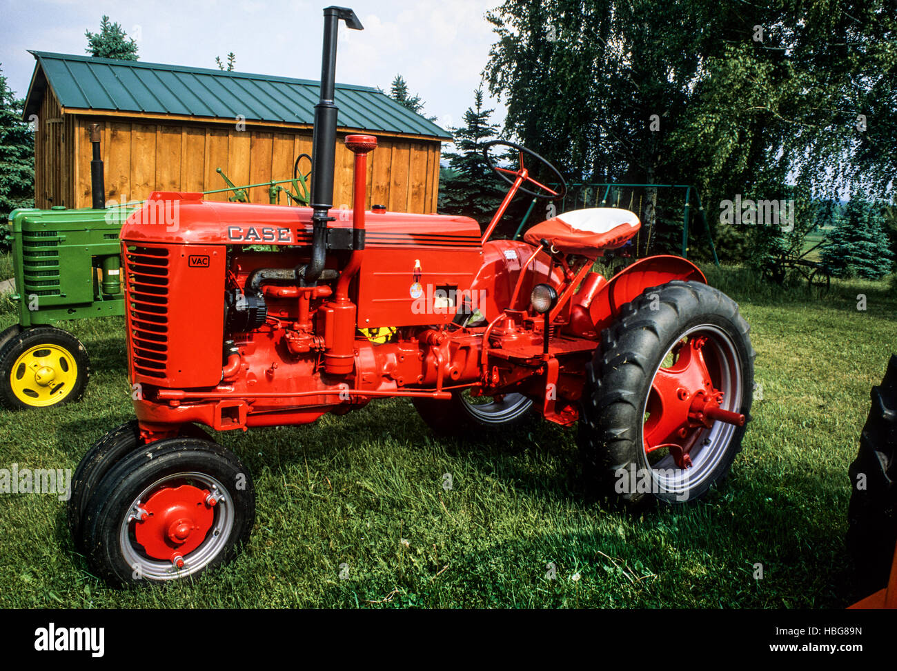 Restored vintage orange  Case tractor, Chautauqua County, New York, USA, Pantone orange, FS15.90MB, vintage tractors, antique images farming Stock Photo