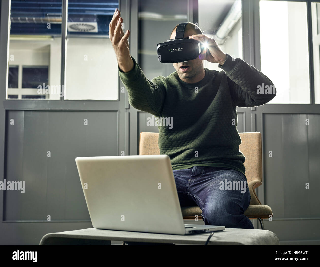 Man with VR goggles, virtual reality glasses Stock Photo