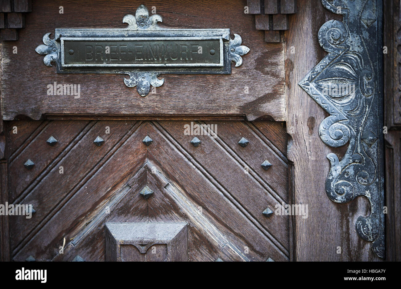 Letter slot on antique, ornate wooden door Stock Photo - Alamy