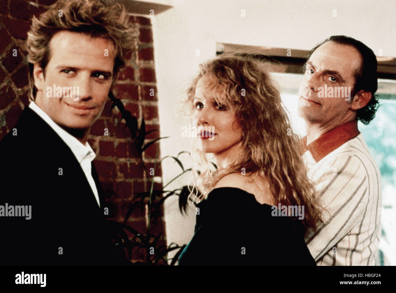 WHY ME?, from left, Christopher Lambert, Kim Greist, Christopher Lloyd,  1990, ©Triumph / courtesy Everett Collection Stock Photo - Alamy, image size:1300x962