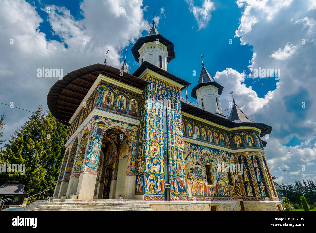 Colorful facade mural painted fresco at Neamt Monastery, Romania Stock Photo