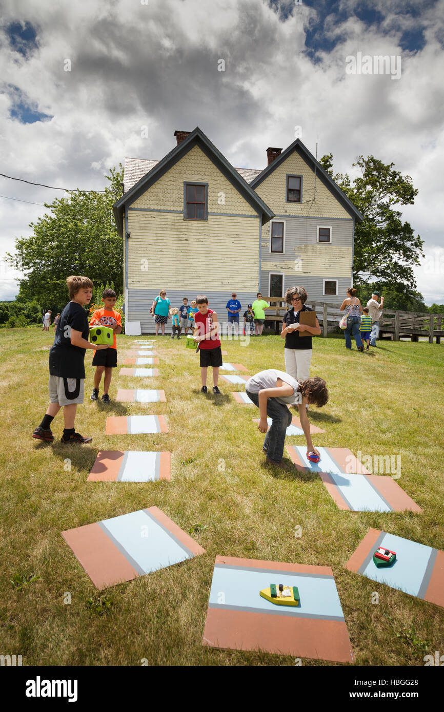 Boys play an Erie Canal game, Schoharie Crossing, New York. Stock Photo