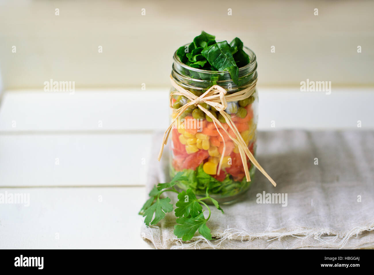 Salad in glass jar stock image. Image of lettuce, mixed - 50992379