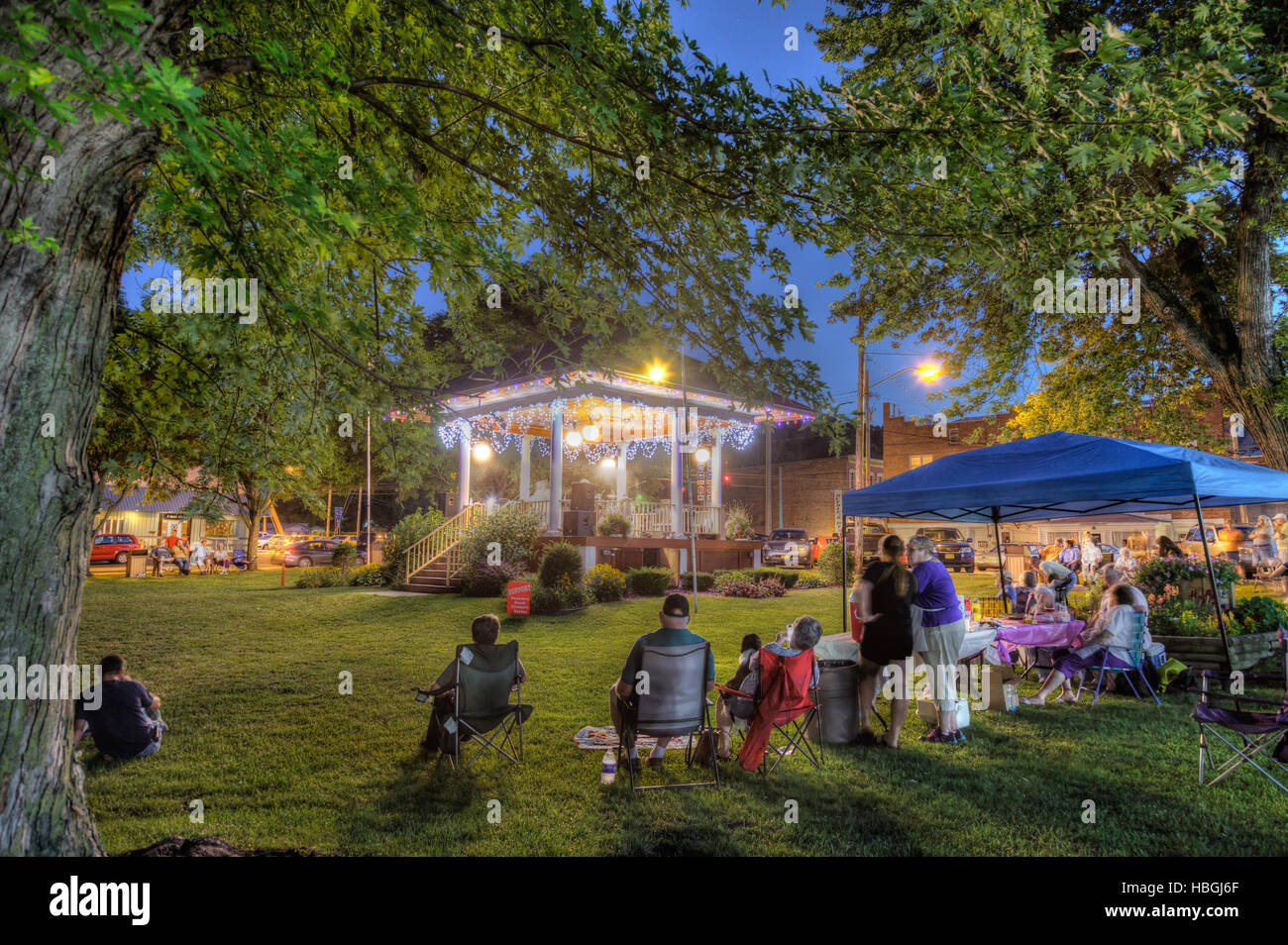 Community enjoys a concert under the bandstand in Hazlett Park, Fort Plain, New York Stock Photo