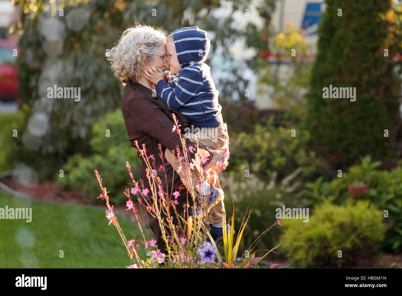 Grandmother kisses grandson, Hazlett Park, Fort Plain, Montgomery County, New York. Stock Photo