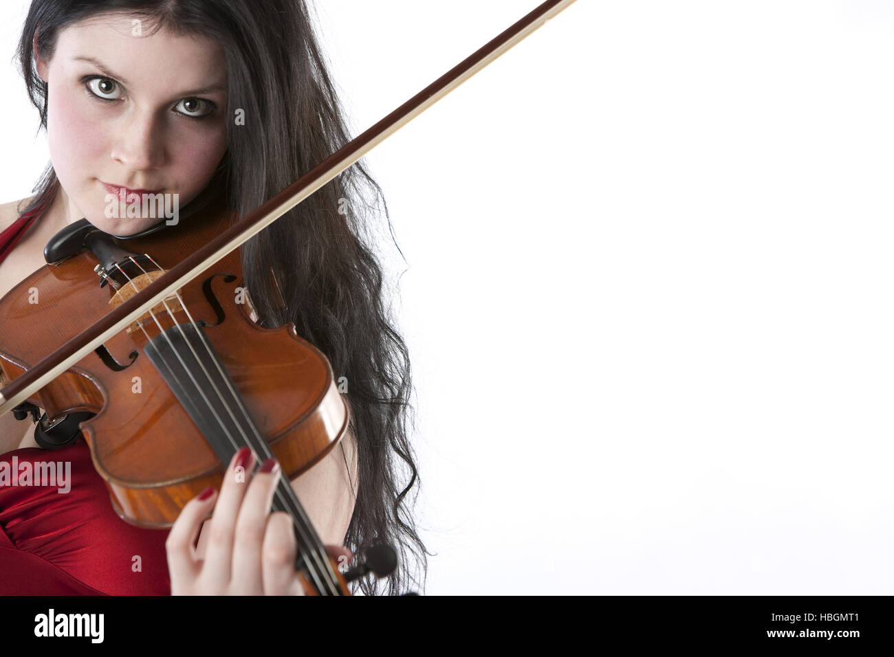 Young female violinist in a red dress Stock Photo Alamy