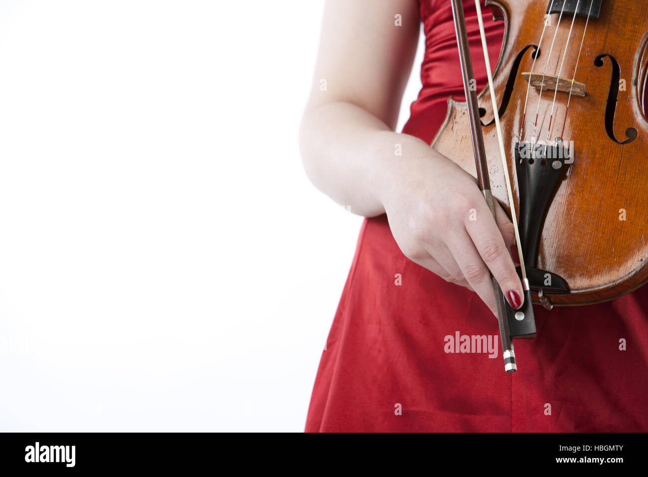 Young female violinist in red dress Stock Photo Alamy