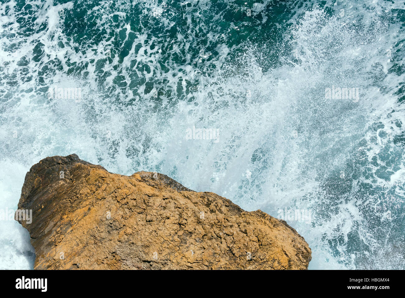 Waves breaking on rocky coast Stock Photo - Alamy