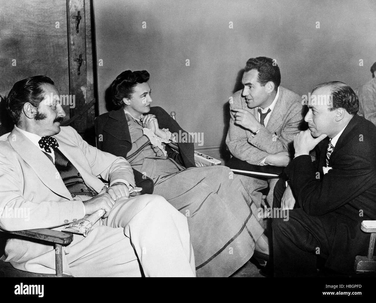 ANOTHER PART OF THE FOREST, from left: Fredric March, Forence Eldridge, director Michael Gordon, screenwriter Vladimir Pozner Stock Photo