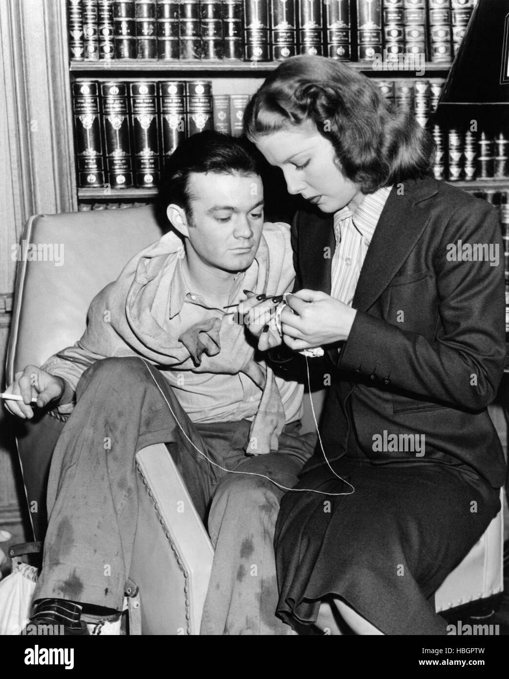 ANGELS WASH THEIR FACES, Ann Sheridan, right, shows Leo Gorcey how to