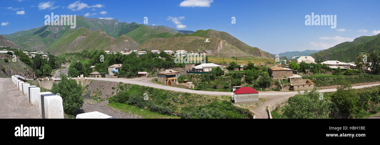 Village in mountains panorama Stock Photo