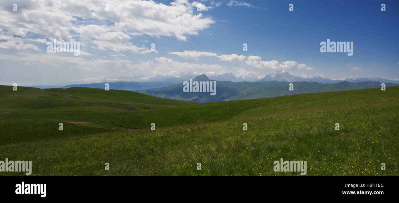 Landscape with snow peaks Stock Photo