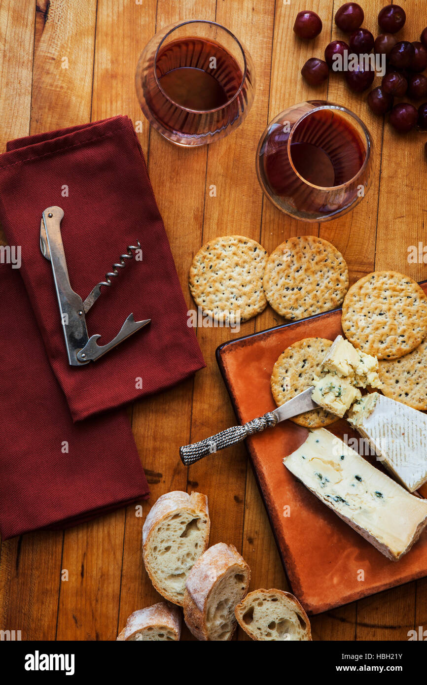 port wine with cambozola triple cream blue cheese, crackers and grapes Stock Photo