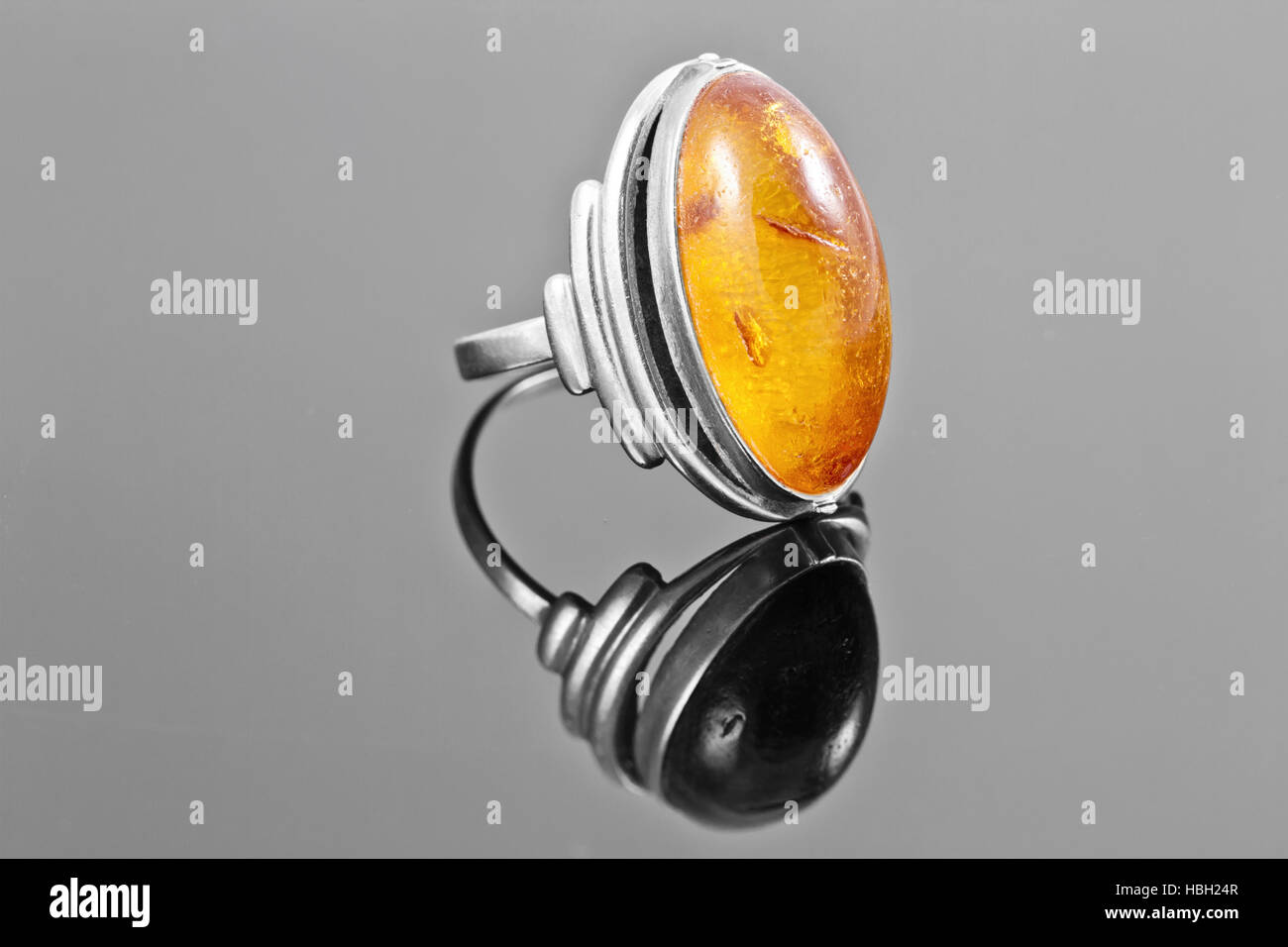 Old gold ring with inset amber Stock Photo