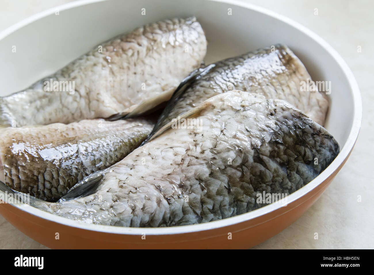 Fish carp in the frying pan Stock Photo Alamy