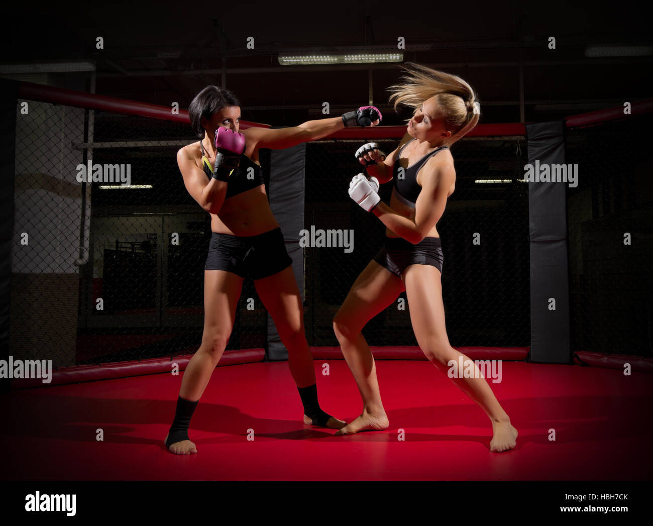 Two wrestler women in sports hall Stock Photo