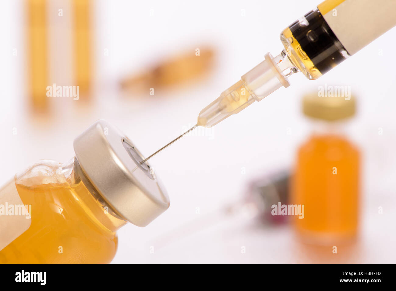 injection with syringe in medical laboratory Stock Photo