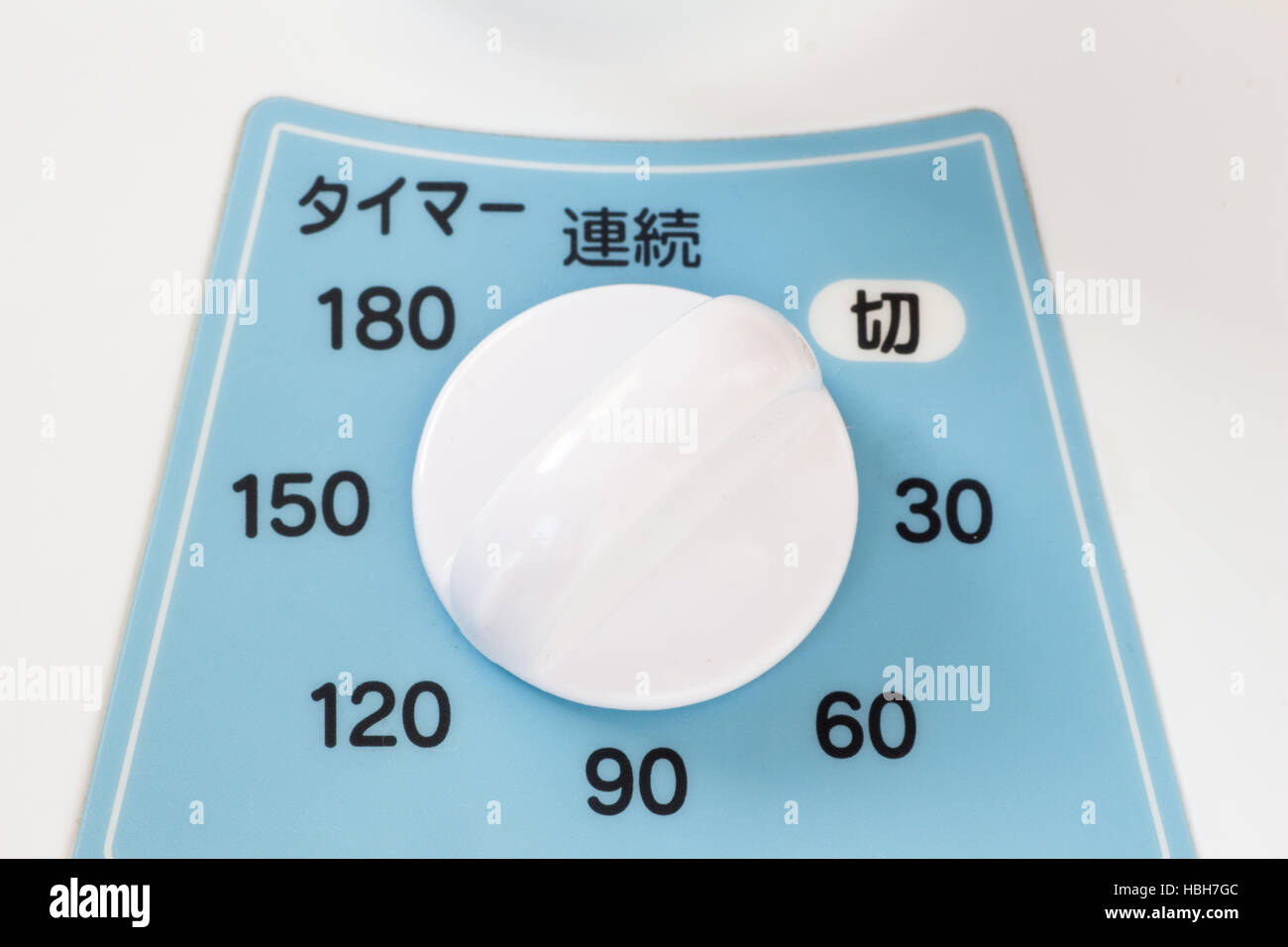 Analog timer device of a bule and white Japanese electric fan Stock ...