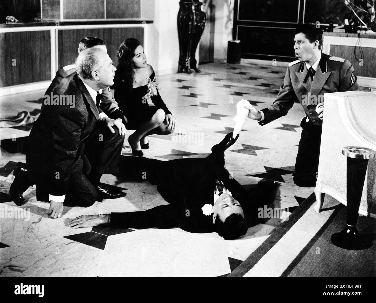 THE BELLBOY, Alex Gerry (L), Jack Durant (laying on the floor), Jerry Lewis (R), 1960. Stock Photo