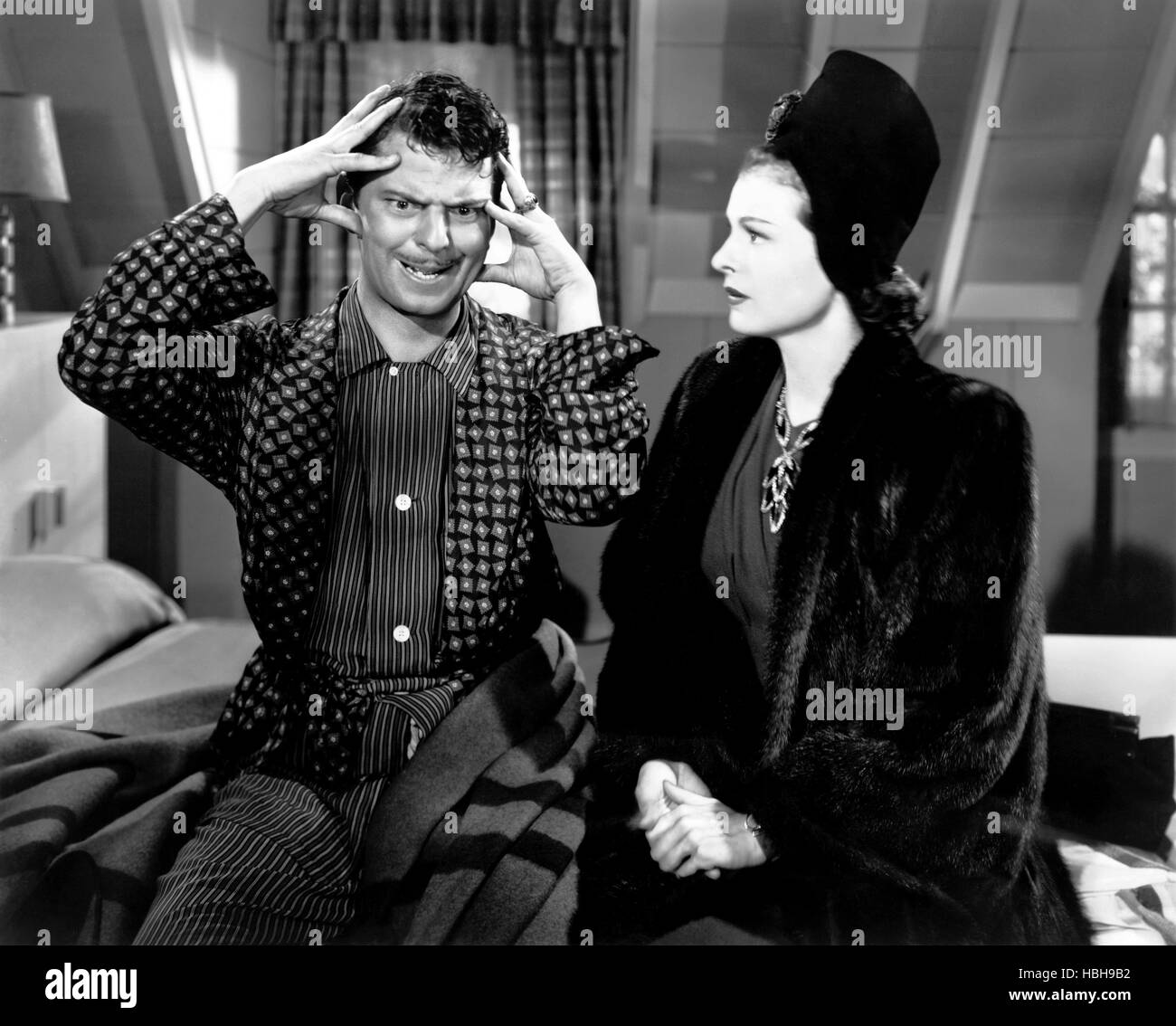 BEDSIDE MANNER, from left, John Carroll, Ruth Hussey, 1945 Stock Photo