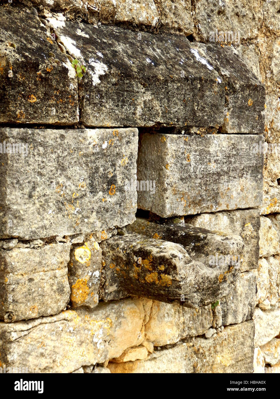 Arrow slit in medieval wall Stock Photo