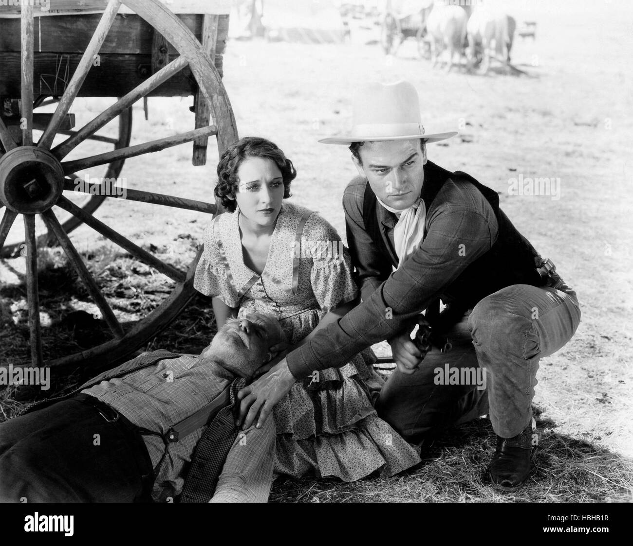 THE BIG STAMPEDE, kneeling, from left, Mae Madison, John Wayne, 1932 ...