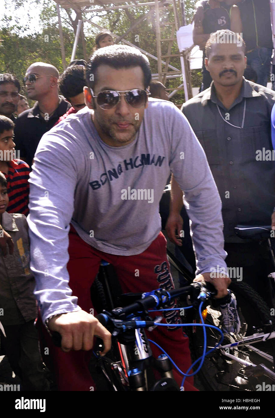 Bollywood actor Salman Khan using cycle as mode of transport on car free day at Carter road, Bandra in Mumbai Stock Photo