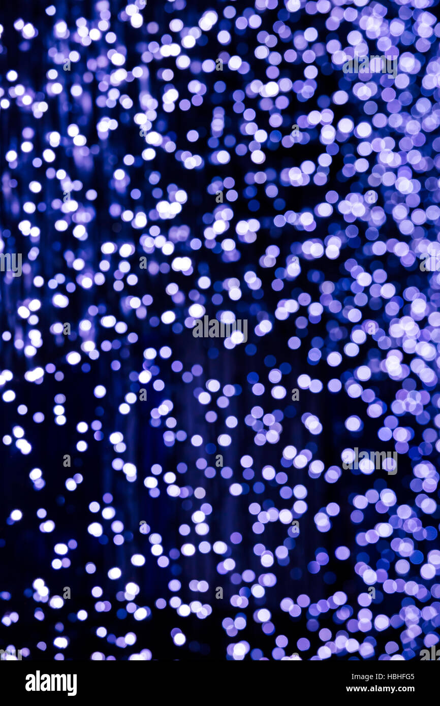 christmas holiday background of defocused blue decoration lights Stock Photo