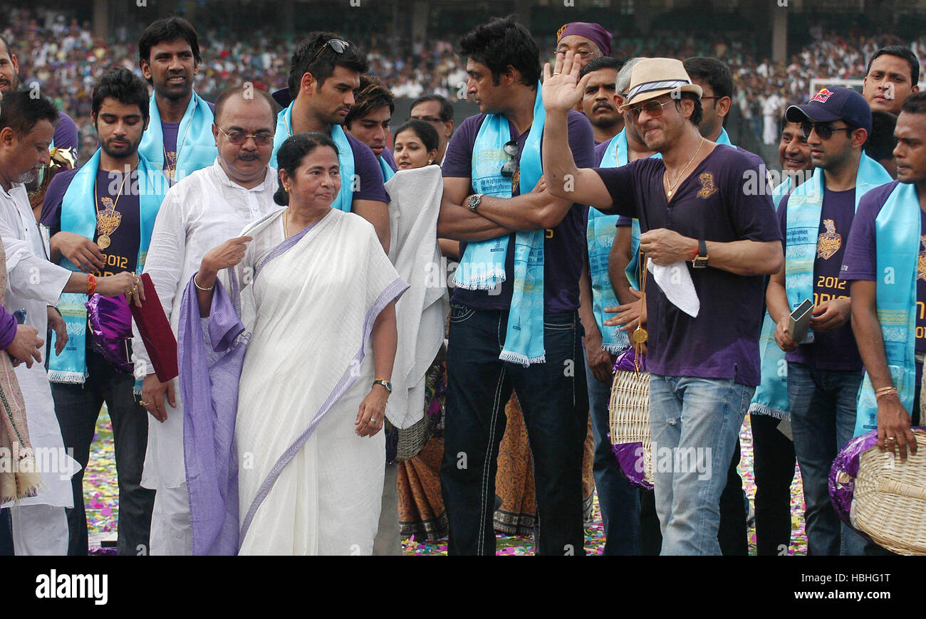 Mamta Banerjee, Chief Minister, celebrating with Kolkata Knight Riders team victory owner Shah Rukh Khan waving grand victory parade Kolkata India Stock Photo