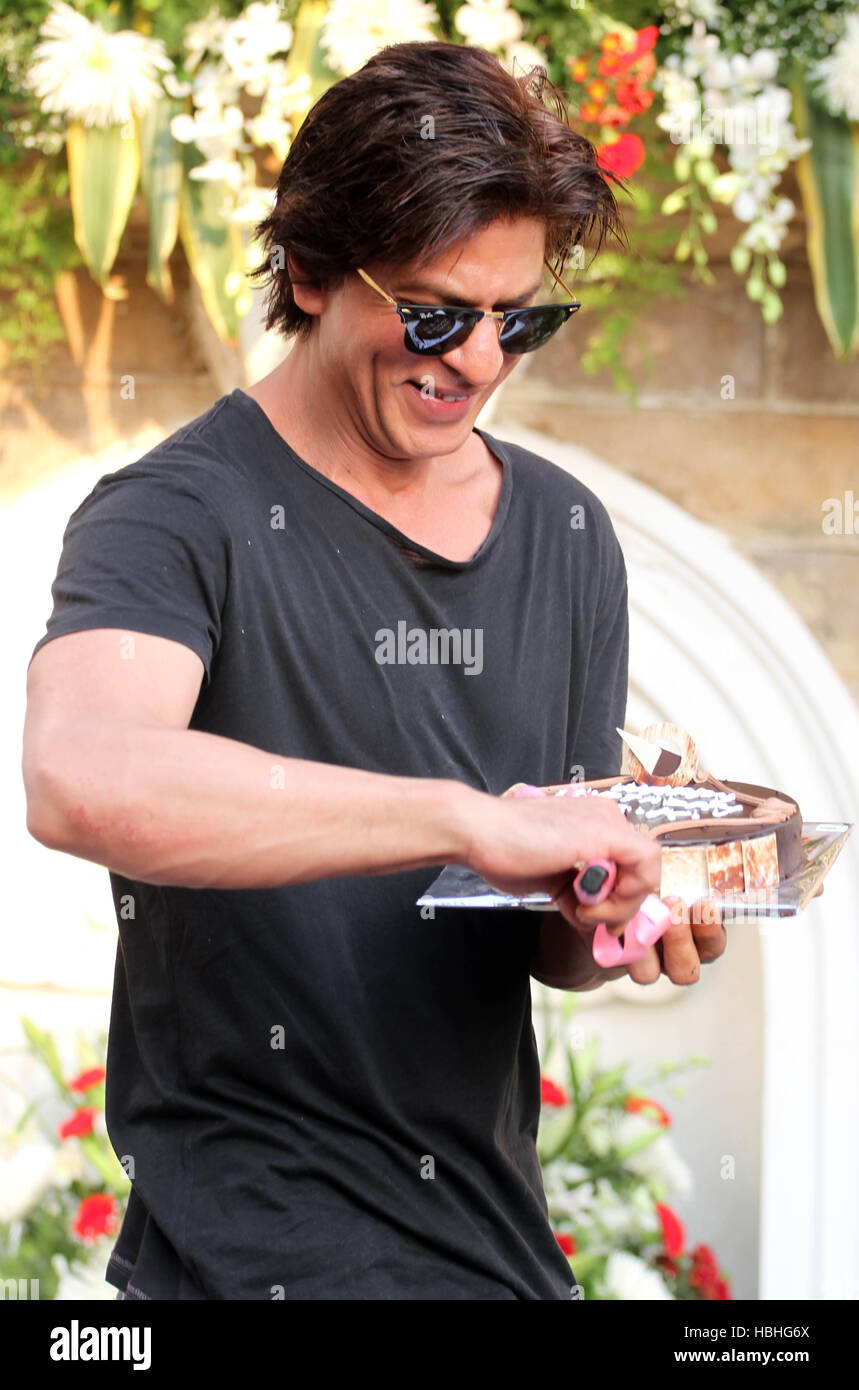 Shahrukh Khan cutting a cake celebrating his birthday, in Mumbai, India