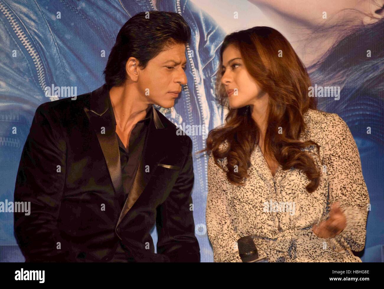 Shah Rukh Khan, Indian Bollywood actor and actress Kajol looking at each other at film Dilwale song launch in Mumbai, India Stock Photo