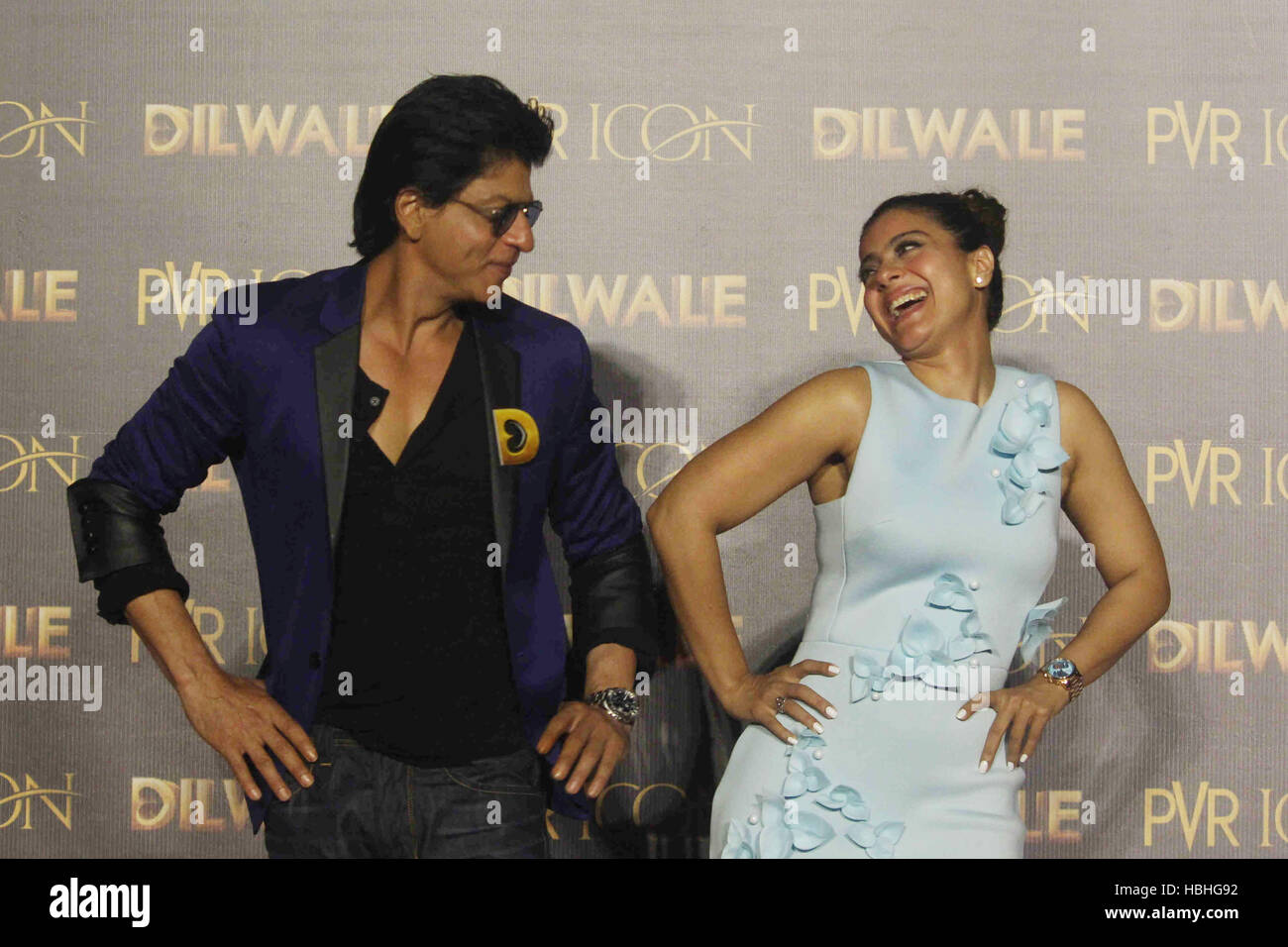 Shah Rukh Khan, Indian Bollywood actor and actress Kajol dancing at film Dilwale song launch in Mumbai, India Stock Photo
