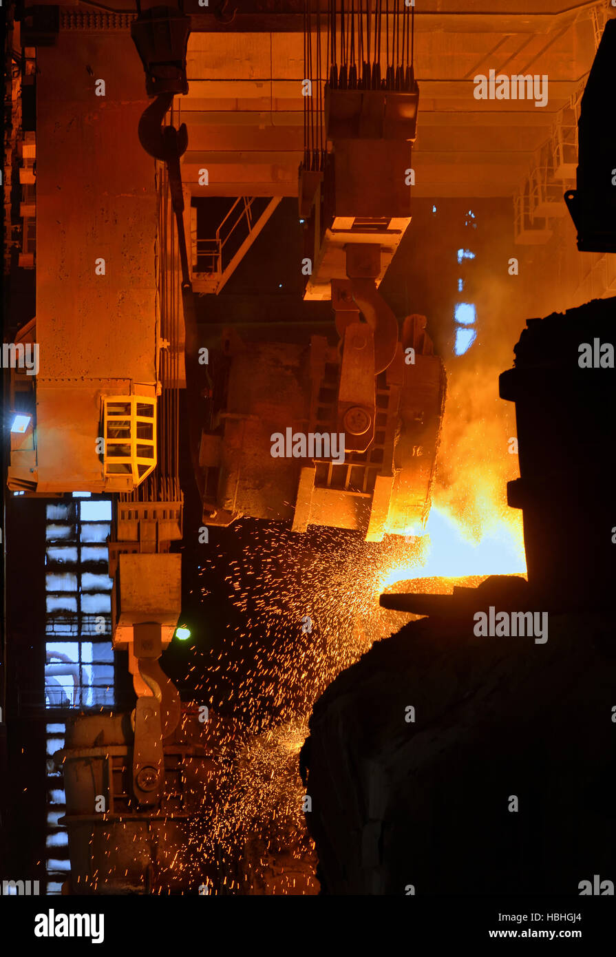 steel mills converter filling hot materials Stock Photo
