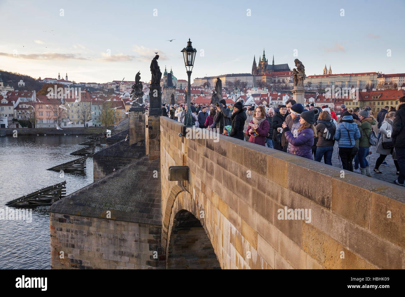 tourists walk on the Charles Bridge, Prague, Czech Republic Stock Photo