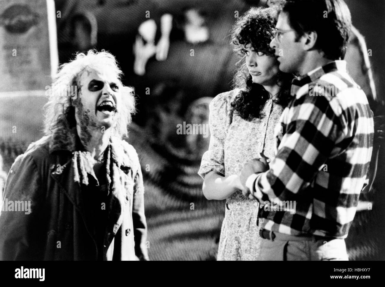 BEETLEJUICE, from left Michael Keaton, Geena Davis, Alec Baldwin, 1988, © Warner Brothers
