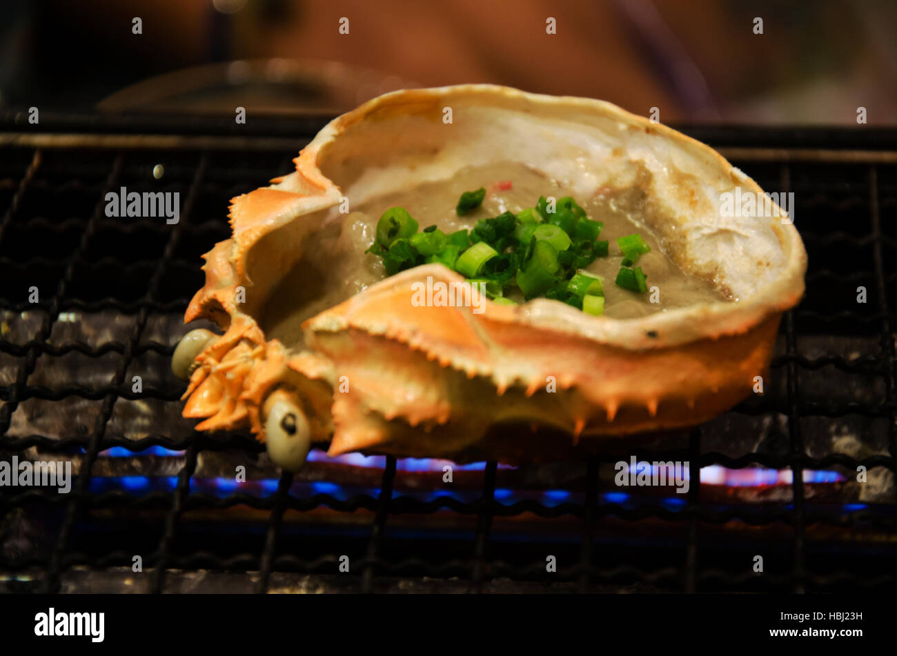 Japanese food crab paste and crab egg on king crab armour grilled