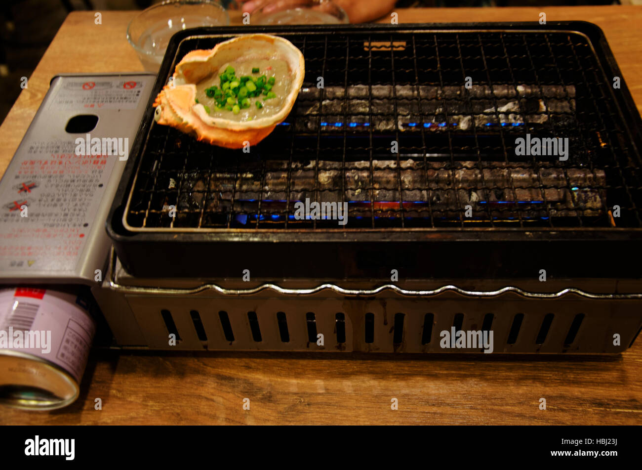 Japanese food crab paste and crab egg on king crab armour grilled