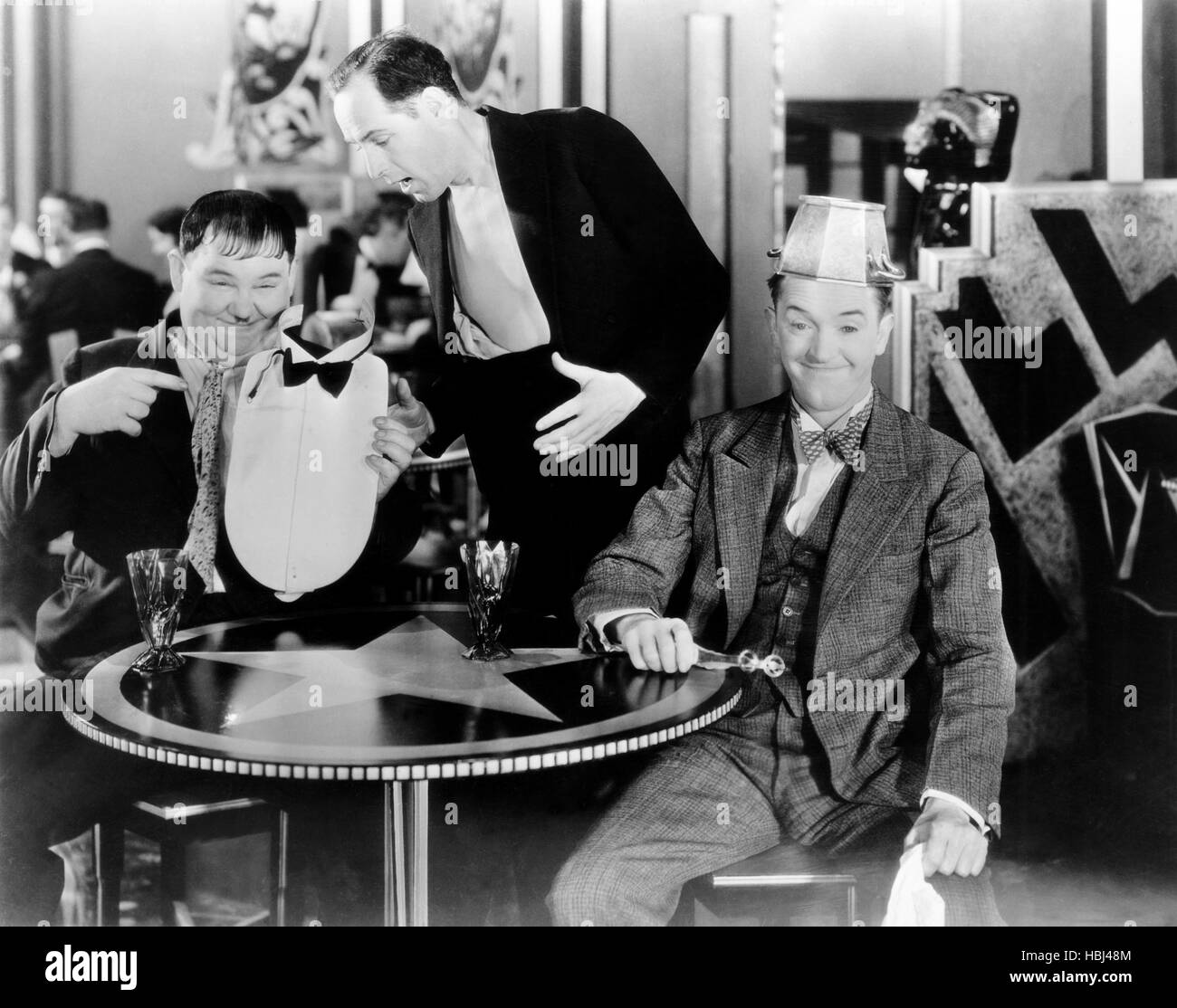 Blotto from left oliver hardy baldwin cooke stan laurel 1930 stock