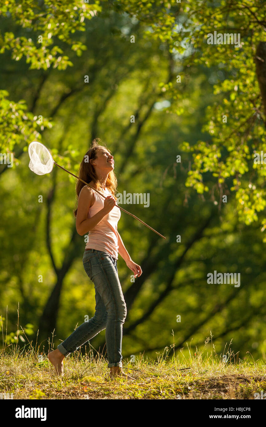 girl with butterfly net Stock Photo Alamy