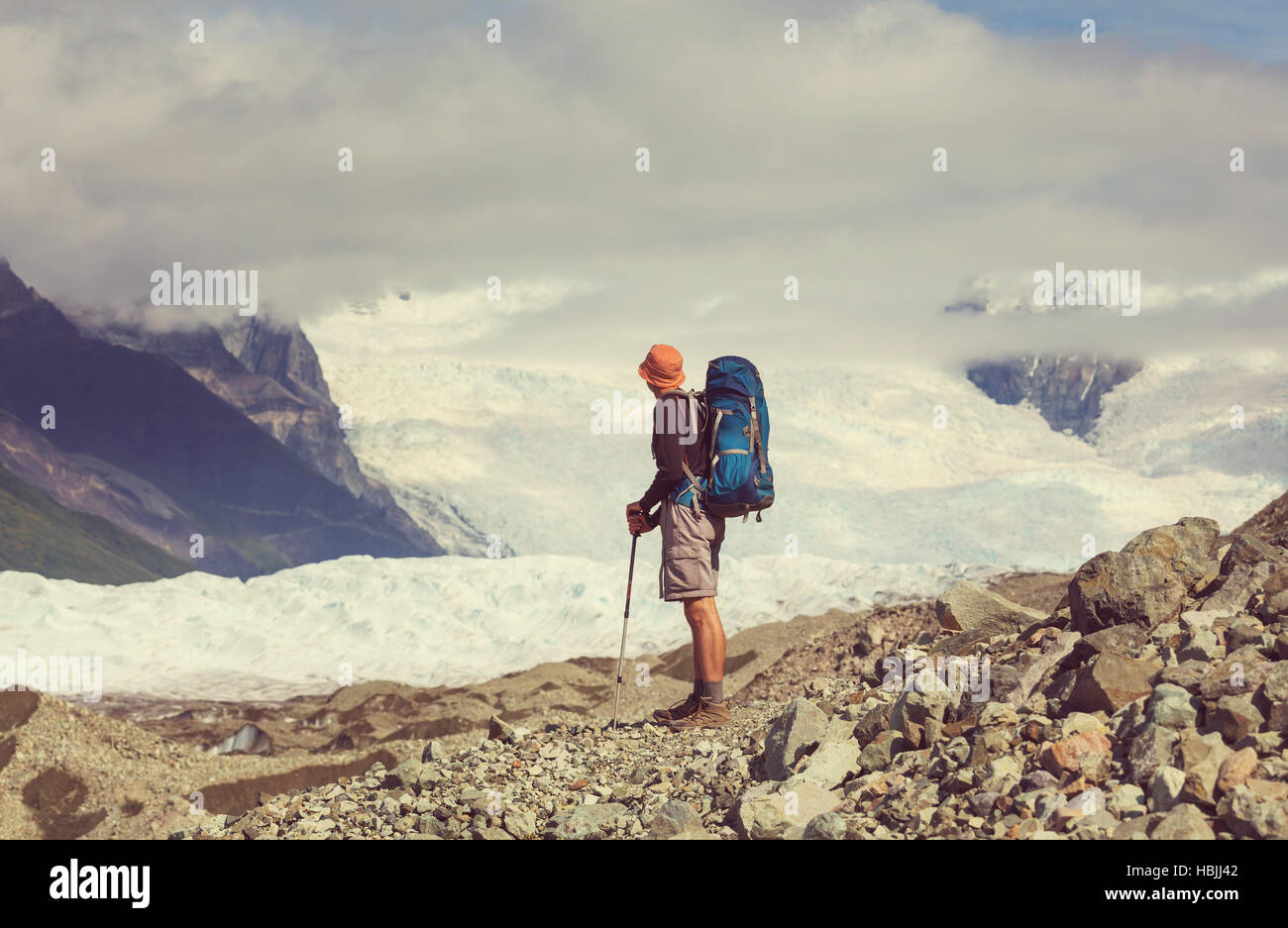 Hiker on glacier Stock Photo
