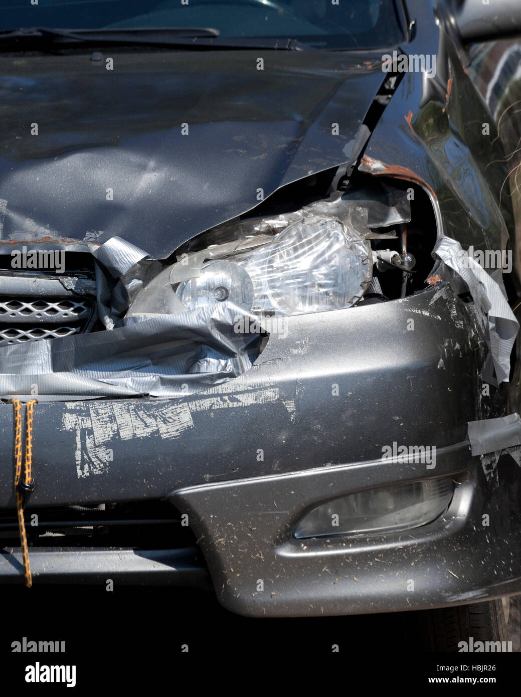 Frontal accident damage of compact Japanese car - USA Stock Photo
