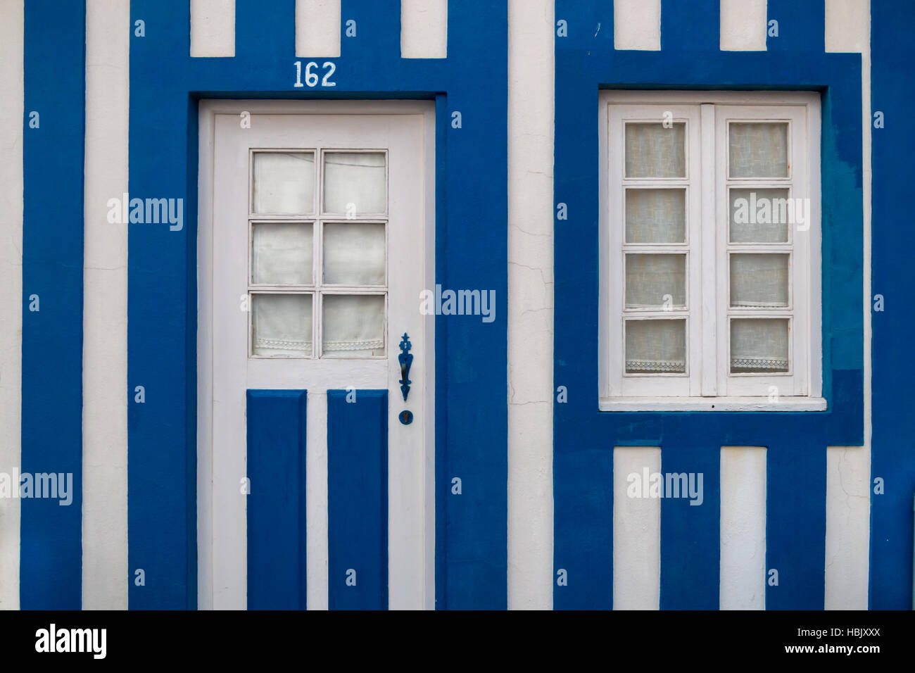 Blue and white house Stock Photo - Alamy
