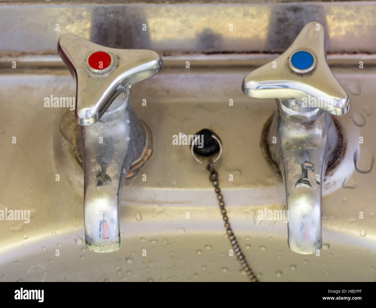 Japanese retro hot water tap with a red mark and cold water tap with a blue mark Stock Photo