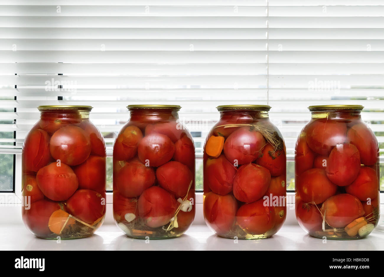 Canned tomatoes in large glass jars Stock Photo Alamy