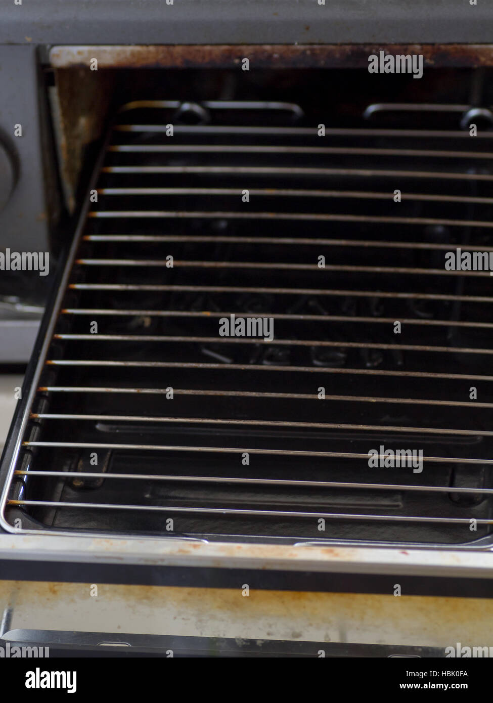 Japanese dirty empty fish grill pan Stock Photo Alamy