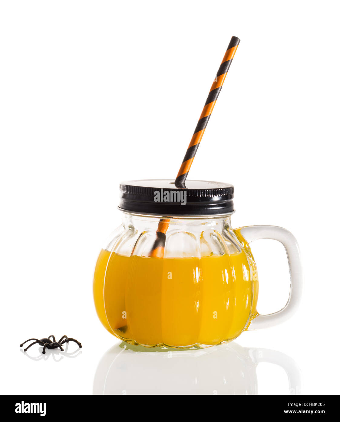 https://c8.alamy.com/comp/HBK205/halloween-drink-served-in-pumpkin-shaped-glass-with-drinking-straw-HBK205.jpg