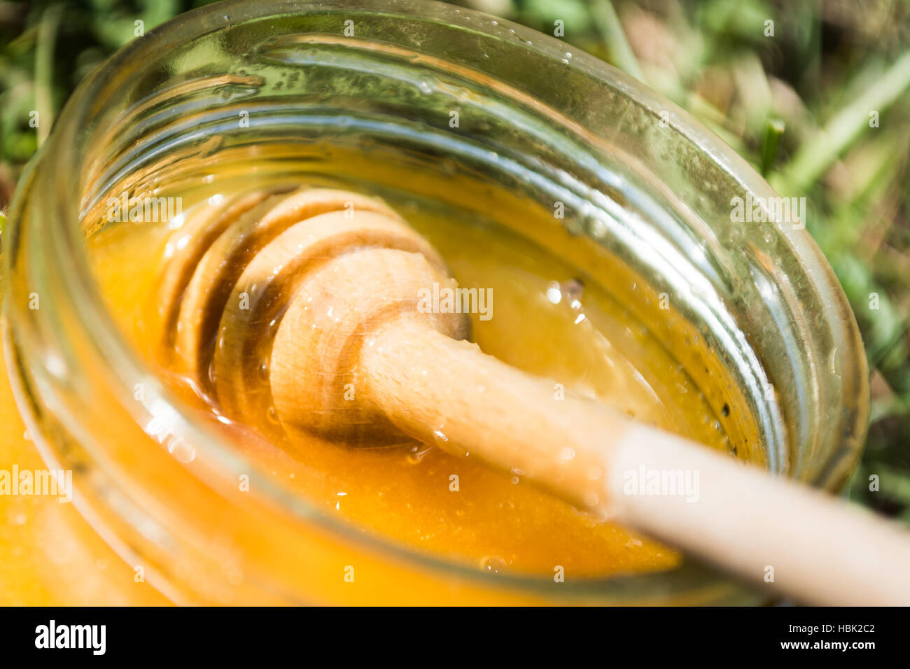Jar full of honey Stock Photo