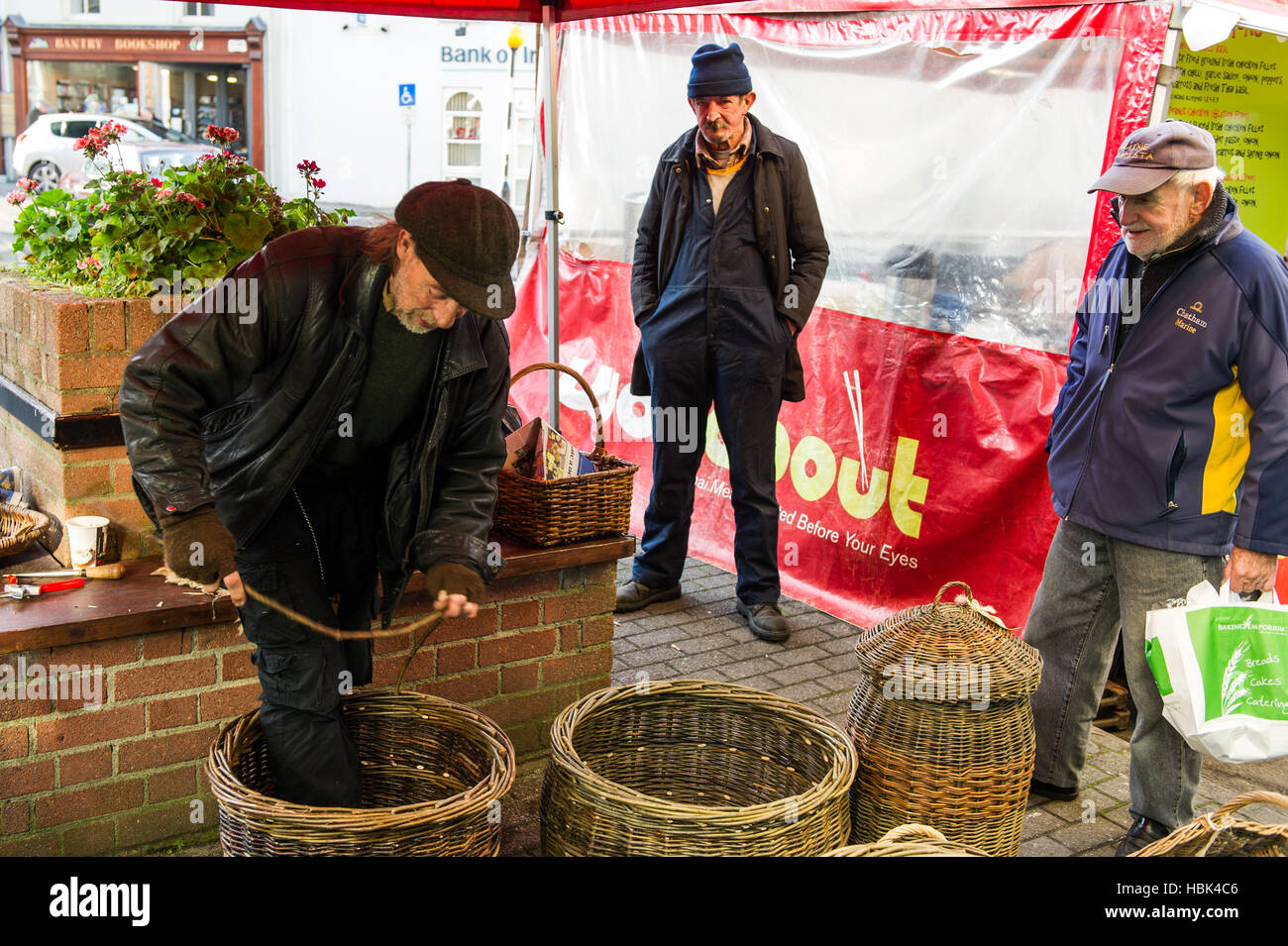 Man demonstrates basket weaving at Bantry Friday Market, Bantry, West