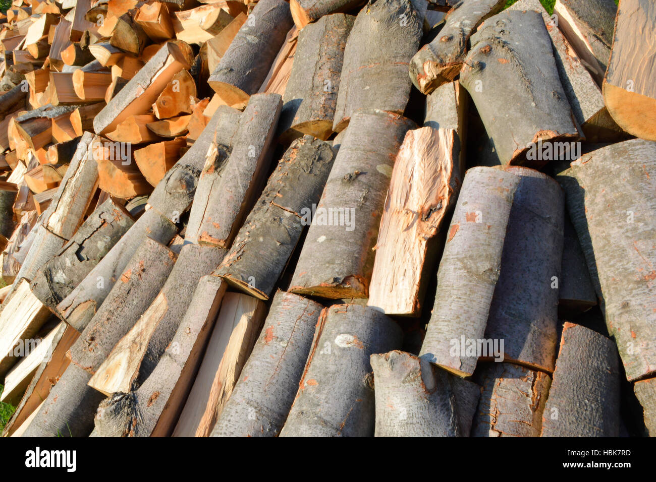 Stacked winter logs for heating Stock Photo