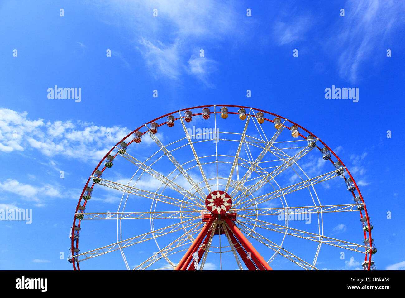 ferris wheel on the blue sky background Stock Photo - Alamy